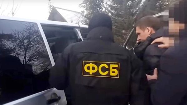 Стоп-кадр видео задержания Вадима Надвоцкого