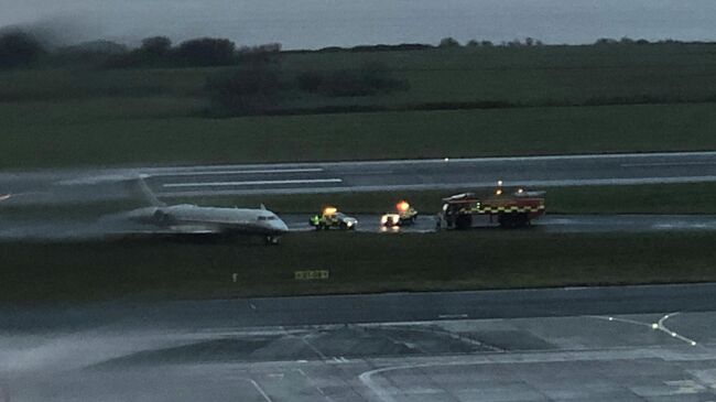 A private jet is seen after skidding off the runway at John Lennon Airport in Liverpool, Britain December 11, 2019. Thom O'Donnell via REUTERS THIS IMAGE HAS BEEN SUPPLIED BY A THIRD PARTY. MANDATORY CREDIT