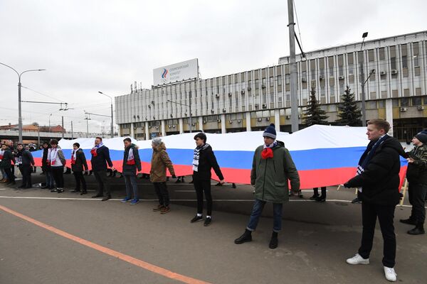 Акция в поддержку российских спортсменов у здания Олимпийского комитета России в Москве