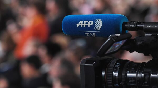 Камера с символикой AFP TV