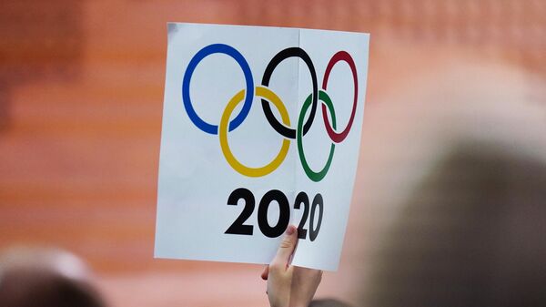 Плакат с олимпийскими кольцами