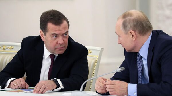 Президент РФ Владимир Путин и председатель правительства РФ Дмитрий Медведев на заседании Государственного совета по вопросам аграрной политики