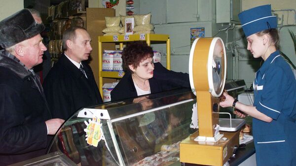 Фотография Владимира Путина в универсаме Елочка в Томске, опубликованная на сайте 20.kremlin.ru