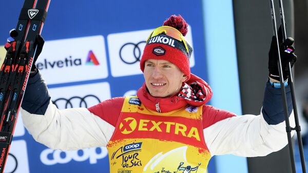 Александр Большунов (Россия), занявший третье место в спринте классическим стилем среди мужчин на соревнованиях по лыжным гонкам Тур де Ски в итальянском Валь-ди-Фьемме.