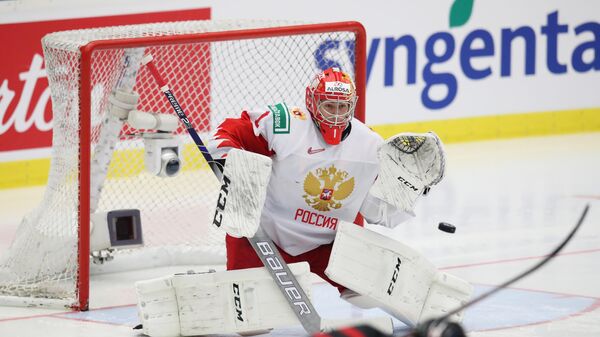 Игровой момент матча Канада - Россия
