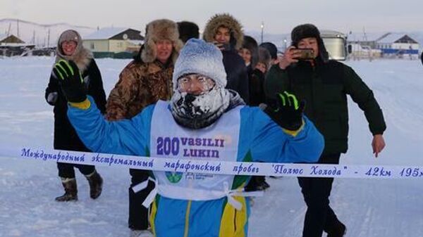 Победитель экстремального марафона Полюс Холода в Якутии Василий Лукин на финише 