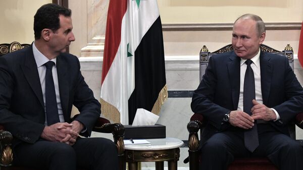 Президент РФ Владимир Путин и президент Сирии Башар Асад во время встречи в Дамаске