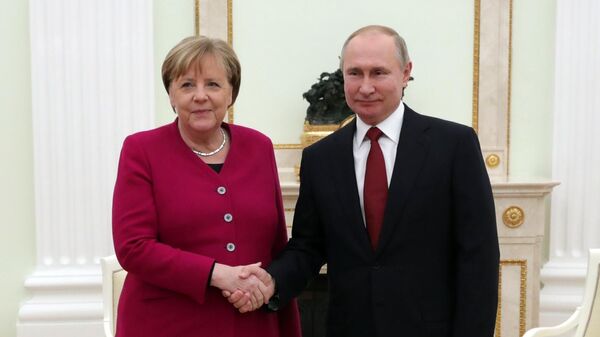  Президент РФ Владимир Путин и федеральный канцлер Германии Ангела Меркель во время встречи
