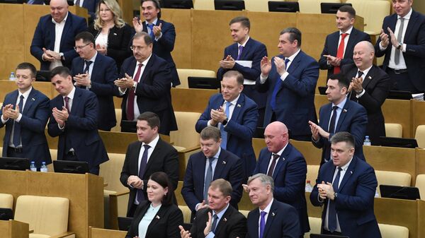 Депутаты на заключительном пленарном заседании осенней сессии Государственной Думы РФ
