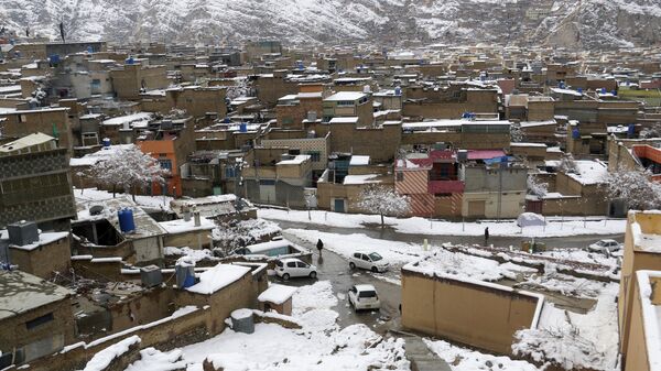 Жилого района после снегопада в Мариабаде, Пакистан. 13 января 2020 
