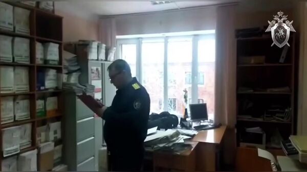Следственные действия в судебном участке мирового судьи в Новокузнецке. Стоп-кадр видео
