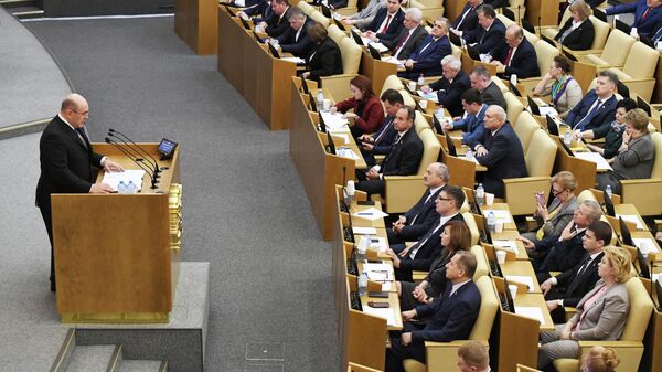 Кандидат на пост премьер-министра РФ Михаил Мишустин во время выступления на пленарном заседании Госдумы РФ