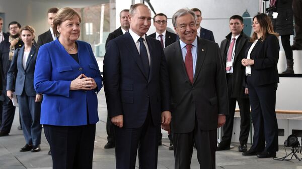  Президент РФ Владимир Путин, федеральный канцлер ФРГ Ангела Меркель и генеральный секретарь ООН Антониу Гутерреш на Международной конференции по Ливии