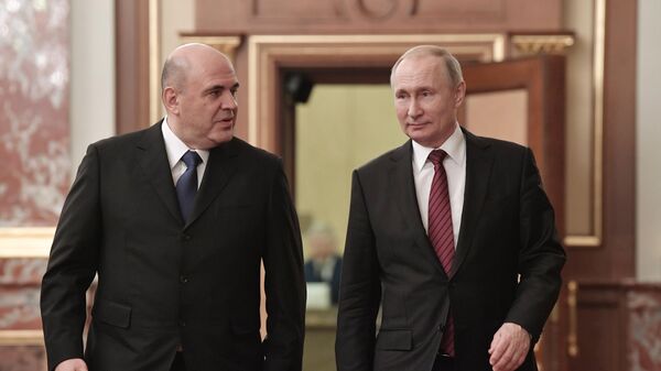 Президент РФ Владимир Путин и председатель правительства РФ Михаил Мишустин перед началом встречи с членами правительства