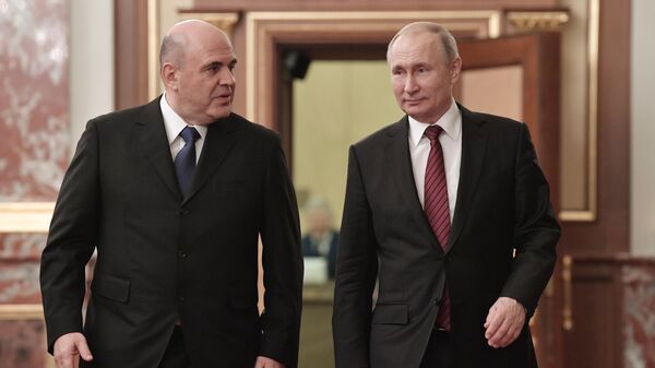 Президент РФ Владимир Путин и председатель правительства РФ Михаил Мишустин перед началом встречи с членами правительства