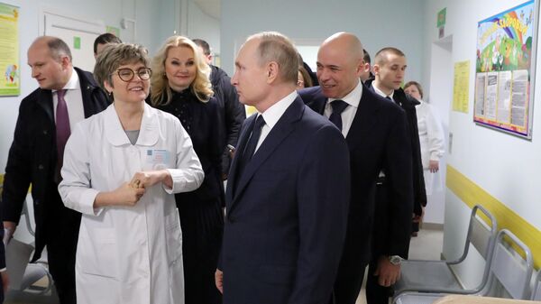 Президент РФ Владимир Путин во время посещения Детской поликлиники ГУЗ Усманская ЦРБ в городе Усмань. 22 января 2020