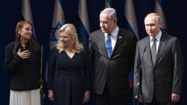 Президент РФ Владимир Путин и премьер-министр Израиля Биньямин Нетаньяху после встречи в Иерусалиме с матерью осужденной в РФ израильтянки Наамы Иссахар Яфрой. 23 января 2020