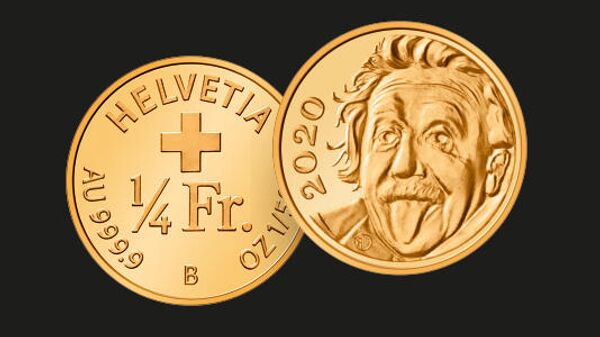 Самая маленькая золотая монета в мире с портретом Альберта Эйнштейна, выпущенная монетным двором Швейцарии
