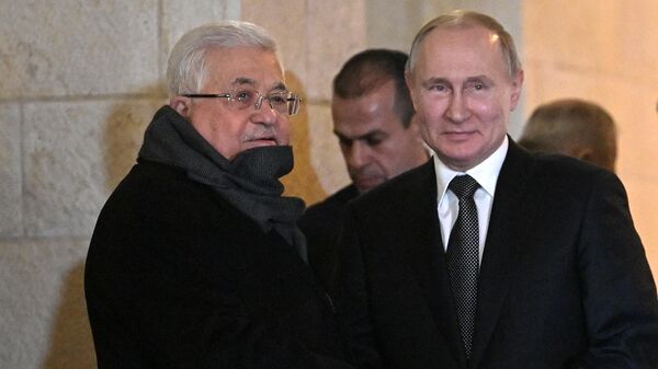 Президент РФ Владимир Путин и президент Государства Палестина Махмуд Аббас (слева) 