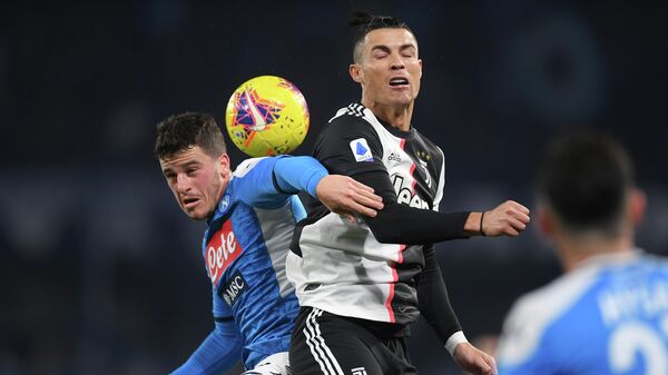 Soccer Football - Serie A - Napoli v Juventus - Stadio San Paolo, Naples, Italy - January 26, 2020   Juventus' Cristiano Ronaldo in action with Napoli's Diego Demme    REUTERS/Alberto Lingria