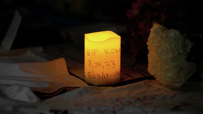 Jan 26, 2020; Ardmore, Pennsylvania, USA; Mourners leave a memorial outside Lower Merion High School after the sudden passing of NBA Kobe Bryant. Mandatory Credit: Bill Streicher-USA TODAY Sports