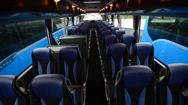 В салоне нового автобуса для обслуживания Кубка конфедераций-2017 во время презентации