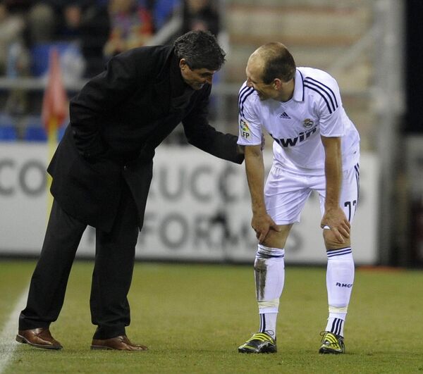 Главный тренер Реала Хуанде Рамос (слева) и полузащитник Арьен Роббен (справа)