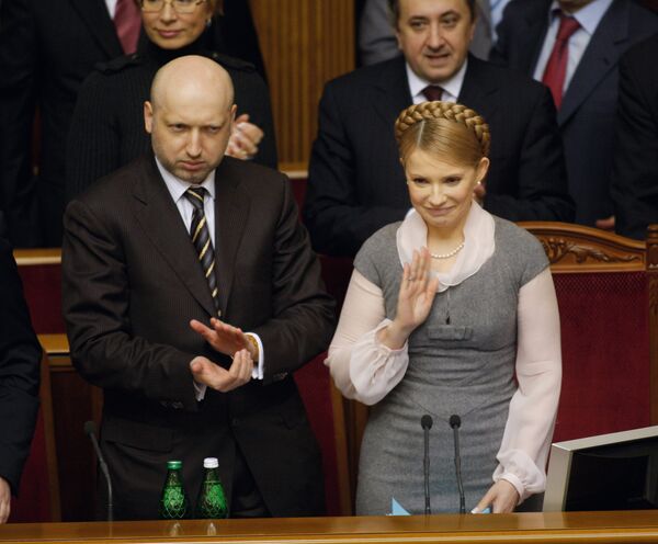 Первый вице-премьер Украины Александр Турчинов и премьер-министр Украины Юлия Тимошенко. Архив