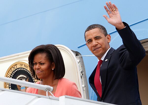 Барака Обама с супругой