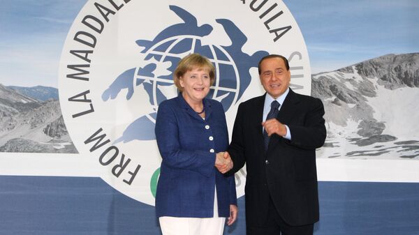 Ангела Меркель и Сильвио Берлускони на саммите Большой восьмерки - 2009