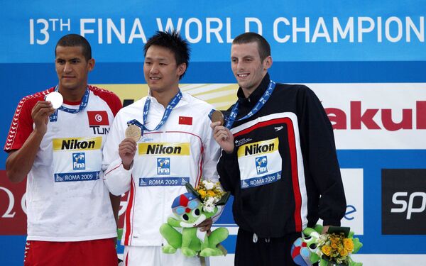 Китайский пловец Чжан Линь выиграл золото, серебро завоевал Усама Меллули из Туниса, бронзу канадец Райан Кохрейн