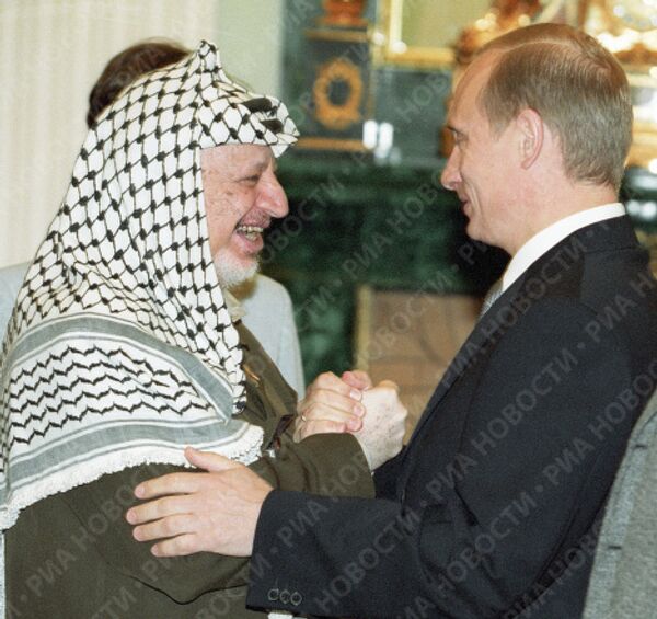 Владимир Путин и Ясир Арафат