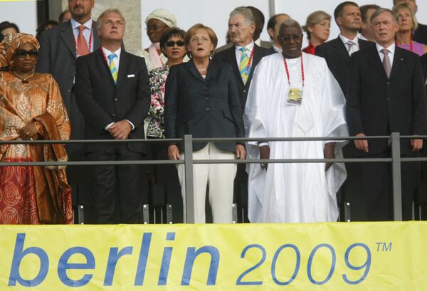 Хорст Келлер, Ламина Диак, Ангела Меркель на церемонии открытия чм по легкой атлетике