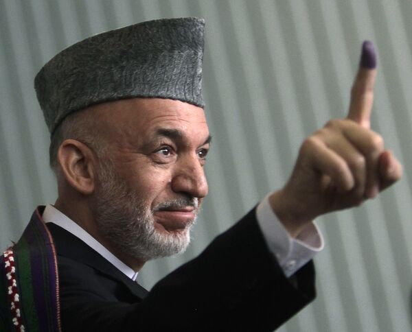 Хамид Карзай после голосования на выборах