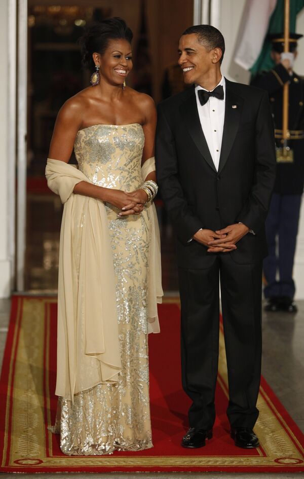 Президент США Барак Обама с супругой Мишель пред началом официального обеда в честь премьер-министра Индии Манмохана Сингха