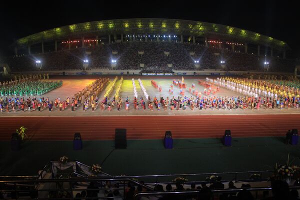 Церемония открытия 25-х Игр Юго-восточной Азии на Национальном стадионе в столице Лаоса Вьентьяне