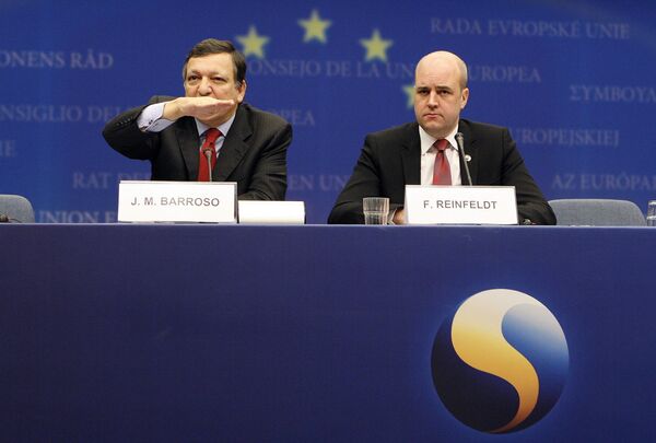 Жозе Мануэл Баррозу и Фредрик Райнфельдт на саммите лидеров Евросоюза в Брюсселе