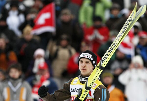 Летающий лыжник швейцарец Симон Амманн