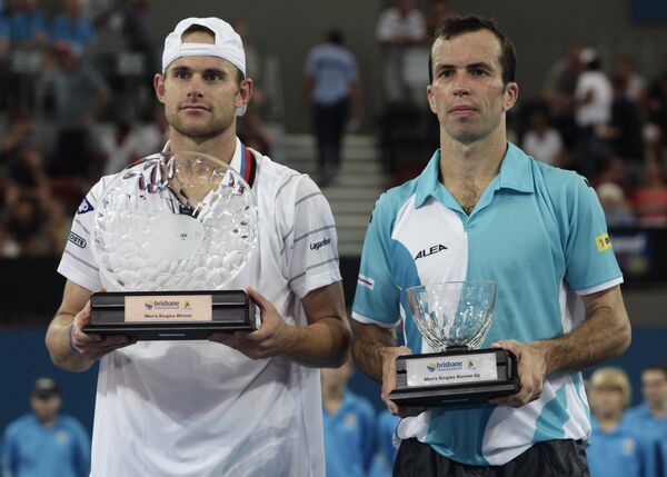 Американский теннисист Энди Роддик (слева) и чешский теннисист Радек Штепанек (справа)