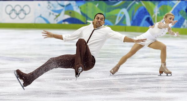 Алена Савченко и Робин Шолковы во время выступления на Олимпиаде в Ванкувере