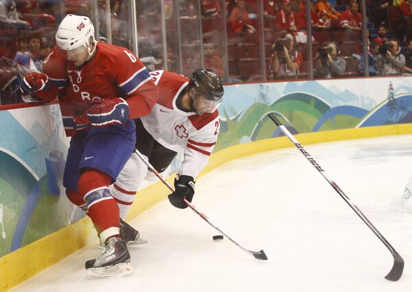 Сборная Швейцарии по хоккею вырвала победу у команды Норвегии в рамках предварительного этапа на Олимпийских играх в Ванкувере - 5:4