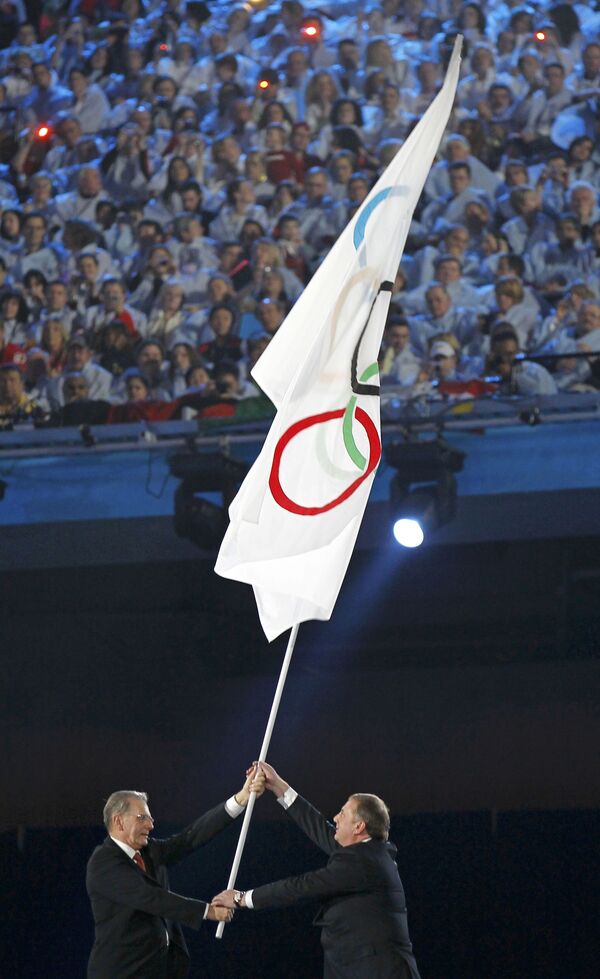 Передача олимпийского флага столице следующих зимних Олимпийских Игр