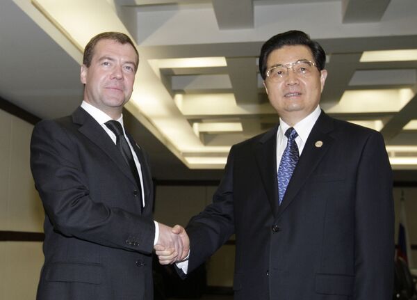 Президент РФ Дмитрий Медведев и председатель КНР Ху Цзиньтао