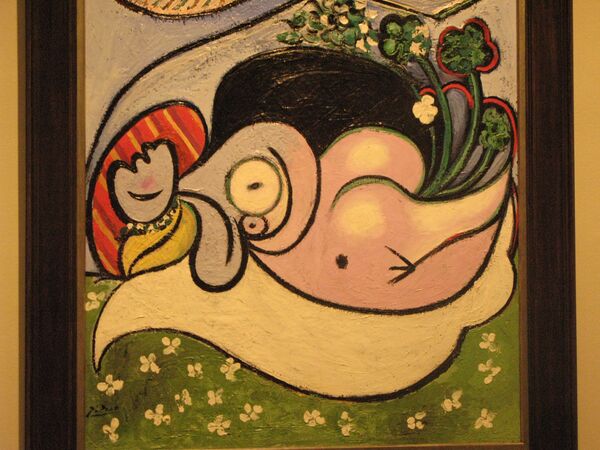 Картина Пабло Пикассо Обнаженная на фоне бюста и зеленых листьев