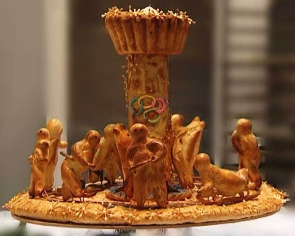 Съедобный факел Олимпиады-2014 испекли на Празднике хлеба в Москве