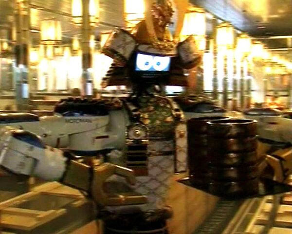 Роботы-официанты приносят блюда и танцуют для клиентов ресторана