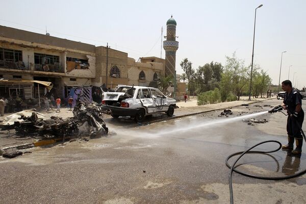 На месте взрыва в Багдаде 20 июня 2010