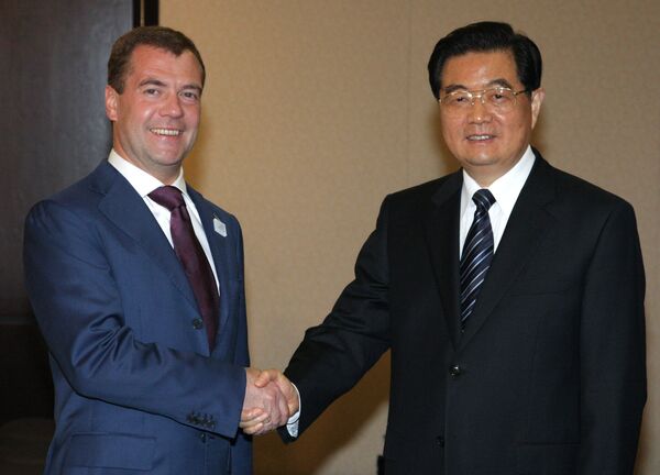 Президент России Дмитрий Медведев и председатель КНР Ху Цзиньтао. Архив.