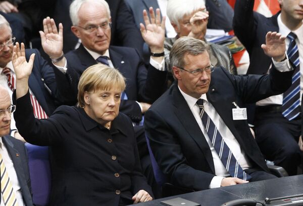 Ангела Меркель и Кристиан Вульф во время выборов президента Германии