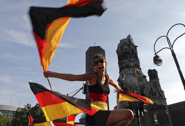 Болельщики празднуют победу сборной Германии над Аргентиной